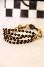 loika armband susa svart guld