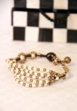 Loika armband susa creme guld